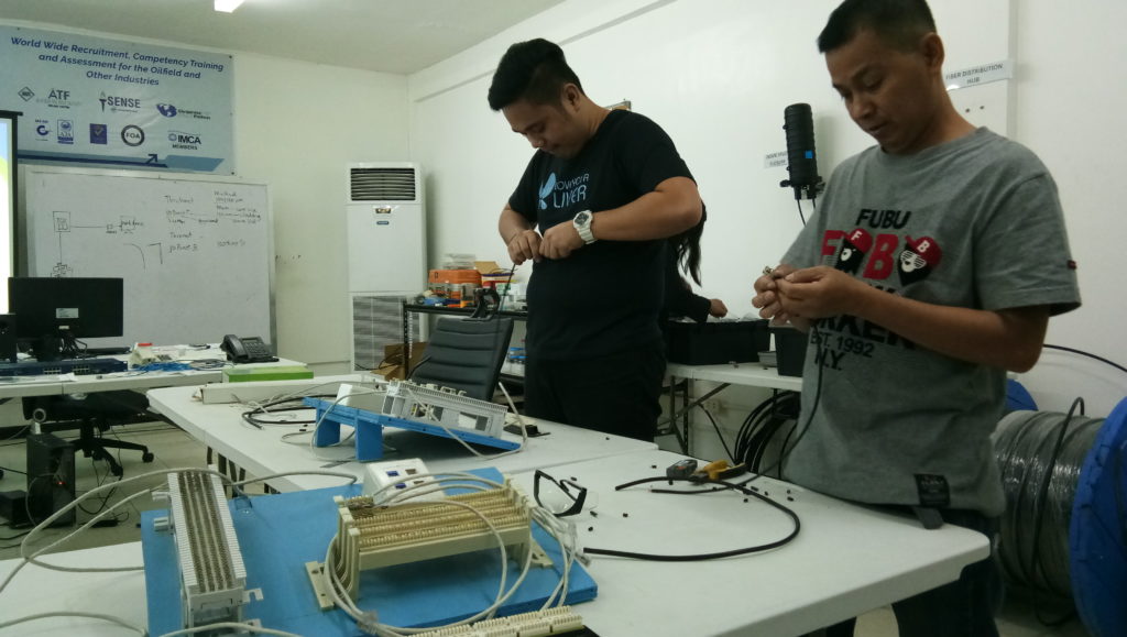 Subnet Services fiber optics training instructor during hands-on work